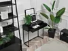 A black console table with an open drawer, placed next to a tall bookshelf and a large potted plant in a modern room setting. Produktbild-Vorschau