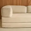 A close-up view of a beige corduroy sofa. Anteprima dell’immagine prodotto