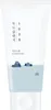 A white tube of facial cleanser with a graphic of rocks in water. Anteprima dell’immagine prodotto