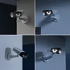 Collage of four images showing Reolink Duo 2 PoE security cameras in different lighting conditions, some with their lights on. Podgląd zdjęcia produktu