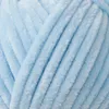 A close-up view of light blue chenille yarn. Podgląd zdjęcia produktu