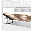 Close-up view of the underside of a white bunk bed, showing the wooden slats of the mattress base and a hydraulic lift mechanism. Náhled obrázku produktu