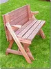 A wooden garden bench that can be converted into a table, set on green grass. Produktbild-Vorschau