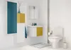 A modern bathroom with a toilet, sink, and storage units. Náhled obrázku produktu