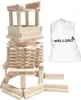 A collection of wooden building blocks stacked to form a tower, next to a white drawstring bag with a logo. Produktbild-Vorschau