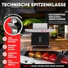 A gas grill is shown on a wooden deck with surrounding greenery. Produktbild-Vorschau