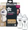 A product shot of Tommee Tippee baby bottles and their packaging. Produktbild-Vorschau