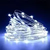 A coiled string of white LED lights against a dark blue background. Podgląd zdjęcia produktu