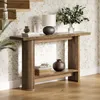 A wooden console table with decorative items in a hallway setting. Podgląd zdjęcia produktu