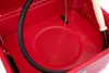 Close-up view of the inside of a red workshop washing device. Produktbild-Vorschau