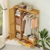 A well-organized bamboo wardrobe with clothes and storage boxes. Podgląd zdjęcia produktu