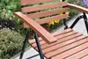 Close-up of a wooden garden chair with black metal frame. Produktbild-Vorschau