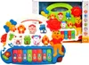 A toy keyboard with animal figures and a cartoon character. Anteprima dell’immagine prodotto