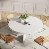 A round white dining table with four chairs around it, set in a dining room with a patterned rug and wood-paneled walls. Náhľad obrázku produktu
