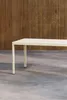 A beige rectangular table with four legs is shown in front of a slatted wooden wall. Podgląd zdjęcia produktu