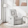 A recliner chair in a living room setting with a floor lamp and artwork. Náhľad obrázku produktu