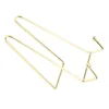 A gold-colored metal display stand for nail art. Podgląd zdjęcia produktu