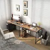 A home office setup with a desk, chair, and computer. Anteprima dell’immagine prodotto