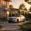 A white car parked under a modern carport in a residential setting at sunset. Produktbild-Vorschau