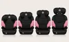 Four car seats of increasing size are displayed side-by-side against a plain background. Anteprima dell’immagine prodotto