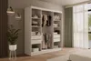 A modern bedroom with a large white wardrobe and a window with green curtains. Produktbild-Vorschau