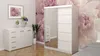 A bedroom scene with a white dresser and a white sliding door wardrobe with a mirror, set against a floral wallpaper. Produktbild-Vorschau
