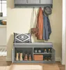 An entryway with a shoe bench, coat rack, and storage above. Náhľad obrázku produktu