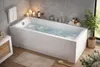 A modern bathroom with a filled bathtub, candles, wine, and a plant. Produktbild-Vorschau
