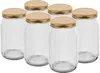 A group of six empty glass jars with gold lids. Produktbild-Vorschau