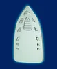 The sole of an iron against a blue background. Náhled obrázku produktu