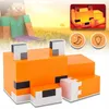 A collage featuring a Minecraft-style fox lamp, a blurred background image of a Minecraft character, and two circular icons. Voir les images du produit