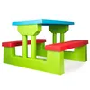 A colorful plastic children's picnic table with attached benches, shown from a slightly angled side view against a white background. Podgląd zdjęcia produktu