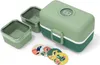 A green and dark green Monbento lunchbox with two smaller green containers and four circular decorative stickers with animal illustrations. Produktbild-Vorschau