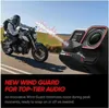 A person riding a motorcycle on a road, with a camera in the foreground, and a graphic representing sound waves. Anteprima dell’immagine prodotto
