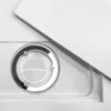 A close-up view of a shower drain with a chrome rim and a white grate. Náhled obrázku produktu