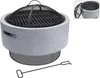 A round, grey fire pit with a black metal grill and mesh cover, shown with a poker tool. Anteprima dell’immagine prodotto