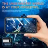 A hand holding a waterproof phone case with a smartphone inside, showing an underwater scene with divers. Anteprima dell’immagine prodotto