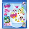 The image shows the back of a Littlest Pet Shop toy box, displaying various toys and accessories. Anteprima dell’immagine prodotto