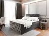 A bedroom scene with a large upholstered bed. Produktbild-Vorschau