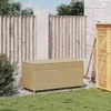A beige poly rattan storage box is placed on a gravel area next to a wooden fence and a green lawn. Náhled obrázku produktu