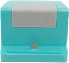 A teal and gray charging dock for a Nintendo Switch or Switch Lite. Produktbild-Vorschau