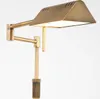 A close-up view of a brass floor lamp. Produktbild-Vorschau