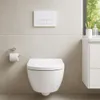 A modern bathroom with a wall-mounted toilet and flush plate. Produktbild-Vorschau