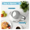 A white and gray electric kettle is shown on a marble countertop, surrounded by breakfast items and a plant. Produktbild-Vorschau