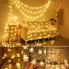 Collage of images showing snowflake string lights used for decoration. Produktbild-Vorschau