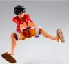 A figurine of Monkey D. Luffy from One Piece in a dynamic pose against a plain background. Podgląd zdjęcia produktu