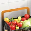 A close-up view of a kitchen cart filled with fresh vegetables, including tomatoes, bell peppers, and cabbage, against a tiled background. Produktbild-Vorschau