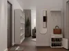 An entryway with a shoe cabinet, mirror, and coat rack. Produktbild-Vorschau