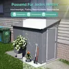 A grey metal garden shed is shown outdoors next to a green recycling bin, with plants and gardening tools nearby. The image is overlaid with text and icons highlighting weather resistance. Produktbild-Vorschau