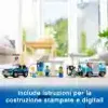 A LEGO City gas station playset with vehicles and minifigures, set up indoors with a window and furniture in the background. Anteprima dell’immagine prodotto